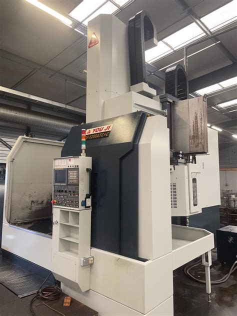 youji cnc machine|CNC Vertical Lathe Machine .